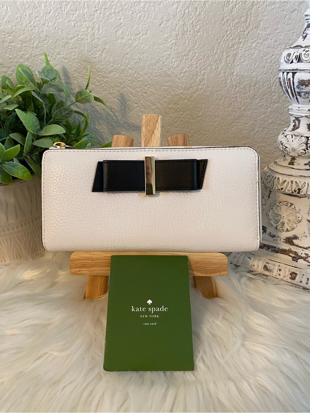 kate spade White Zip-Around Wallet with Black Bow